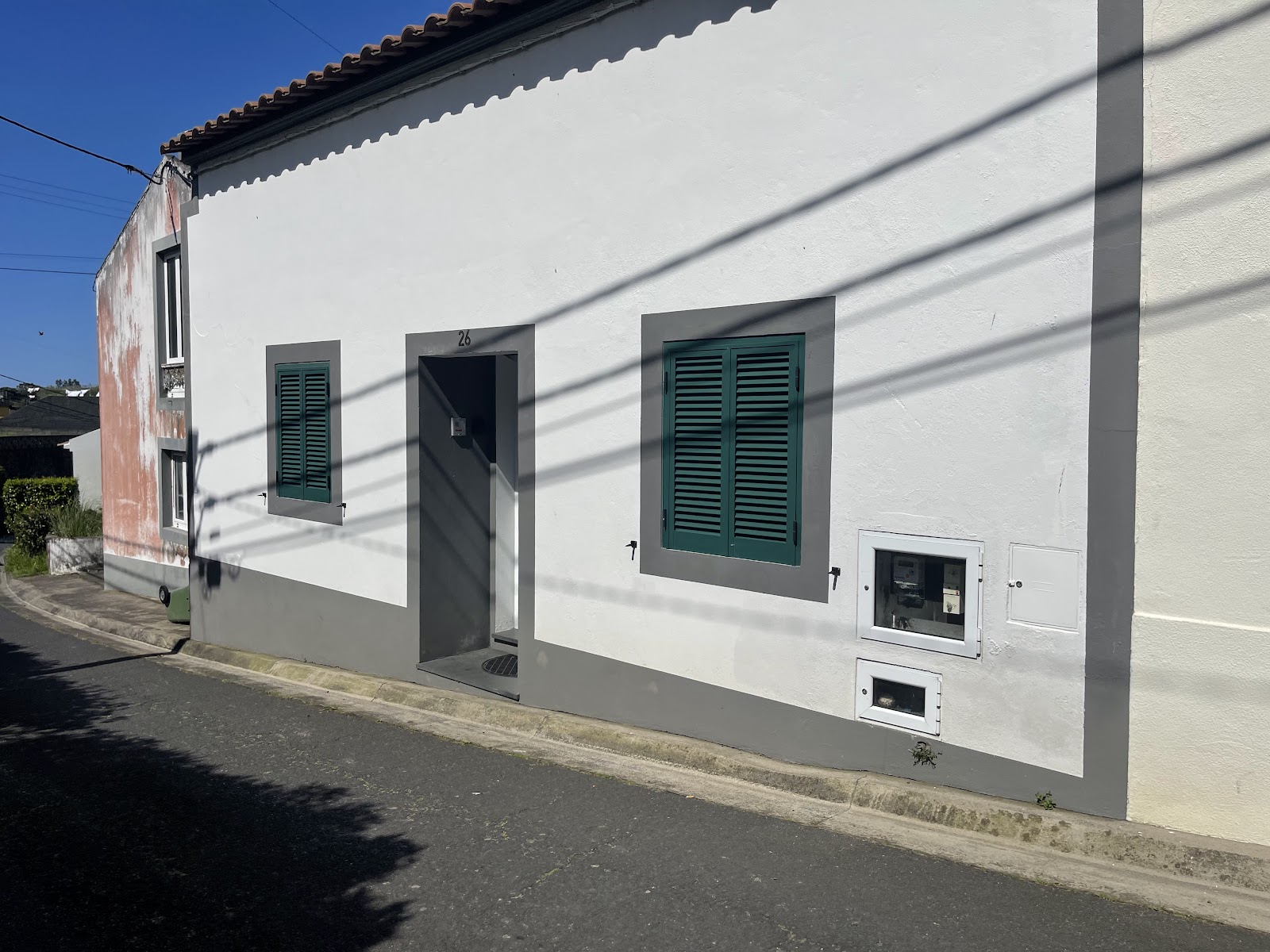 Casa da Adega traditional exterior with green shutters
