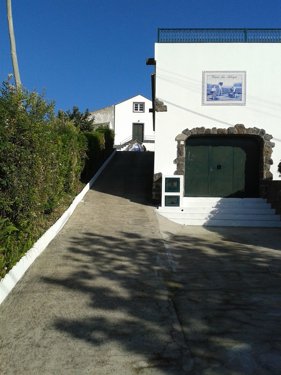 Casa da Adega sign and green entrance door